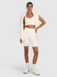 4F Legginsy kolarki treningowe bezszwowe damskie - beżowe XS/S. Brązowe legginsy damskie 4f, l, bez wzorów, z dzianiny. Za 119.99 zł.