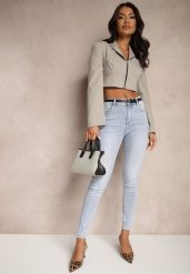 Niebieskie Jeansy o Kroju Slim High Waist Zdobione Haftem w Kształcie Serca Araniah. Niebieskie jeansy damskie Renee, z podwyższonym stanem. Za 79.99 zł.