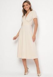 Jasnobeżowa Sukienka Rozkloszowana z Wiskozą z Poduszkami w Ramionach Awerla. Brązowe sukienki damskie Born2be, na co dzień, l, bez wzorów, z wiskozy, eleganckie, bez kołnierzyka, bez ramiączek, midi, rozkloszowane. Za 149.99 zł.
