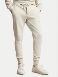 Polo Ralph Lauren Spodnie dresowe 710881518516 Kremowy Regular Fit. Białe spodnie dresowe męskie Polo Ralph Lauren, bez wzorów, z bawełny. Za 729.99 zł.