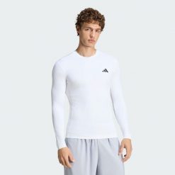 Koszulka PrimeLift Essentials Workout Long Sleeves. Białe koszulki męskie z długim rękawem Adidas, uniwersalny, z dzianiny. Za 199.00 zł.