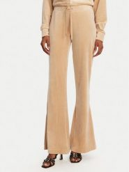 Juicy Couture Spodnie dresowe Christine JCWBJ125304 Beżowy Flared Leg. Brązowe spodnie dresowe damskie Juicy Couture, m, bez wzorów, z dresówki. Za 229.99 zł.