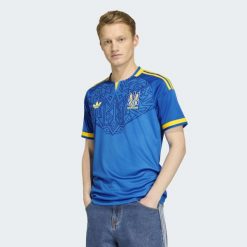 Koszulka wyjazdowa Ukraina 26. Niebieskie t-shirty sportowe męskie Adidas, bez ramiączek, do piłki nożnej, climacool (adidas). Za 439.00 zł.
