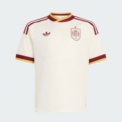 Dziecięca koszulka wyjazdowa Hiszpania 26. Białe bluzki sportowe damskie Adidas, m, z materiału, bez kołnierzyka, bez ramiączek. Za 329.00 zł.