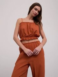 BGN Top w kolorze pomarańczowym rozmiar: 38. Pomarańczowe topy damskie BGN, bez wzorów, z bawełny, bez kołnierzyka. Za 32.98 zł.