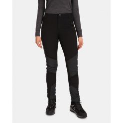 Damskie spodnie outdoorowe Kilpi NUUK-W. Czarne spodnie dresowe damskie Kilpi, l, bez wzorów, z nylonu. Za 277.46 zł.