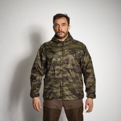 Kurtka myśliwska wodoodporna lekka Solognac 100 camo. Zielone kurtki męskie SOLOGNAC, l, bez wzorów, z materiału, bez kaptura. Za 79.99 zł.