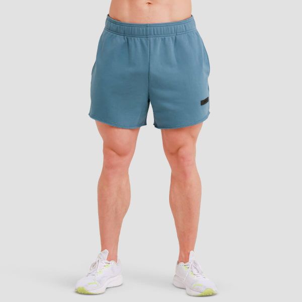 Szorty męskie fitness luźne niebieskie Unity. Niebieskie szorty męskie GYMBEAM, l, z bawełny, na fitness i siłownię. Za 76.90 zł.