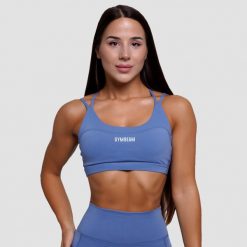 Biustonosz sportowy damski fitness bez zapięcia niebieski FIT. Niebieskie biustonosze sportowe damskie GYMBEAM, bez wzorów, z elastanu. Za 85.90 zł.