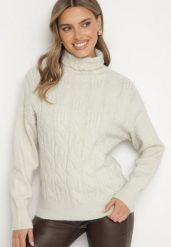 Beżowy Klasyczny Golf Ozdobiony Tłoczeniem Dainaria. Brązowe golfy damskie Born2be, bez wzorów, z jeansu, bez ramiączek. Za 49.99 zł.