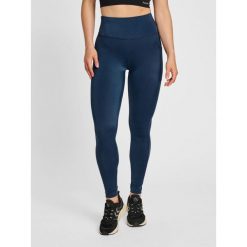 Damskie wysokie legginsy Hummel TE Tola. Niebieskie legginsy sportowe damskie HUMMEL, na wiosnę, xl, bez wzorów, z elastanu, na fitness i siłownię. Za 268.50 zł.