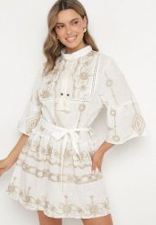 Biała Rozkloszowana Sukienka z Wiskozą Bawełną Haftami i Paskiem Galhiris. Białe sukienki damskie Born2be, na co dzień, na lato, bez wzorów, z bawełny, eleganckie, bez kołnierzyka, bez ramiączek, mini, rozkloszowane. W wyprzedaży za 95.99 zł.
