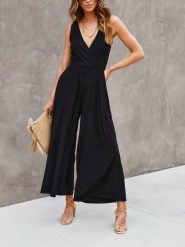 Milan Kiss Kombinezon w kolorze czarnym rozmiar: S. Czarne kombinezony damskie Milan Kiss, s, bez wzorów, bez kołnierzyka, bez ramiączek. Za 187.95 zł.