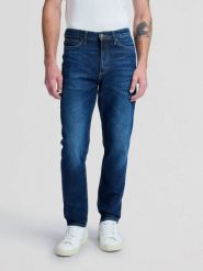 MESKIE SPODNIE LEE AUSTIN MIDNIGHT BLUE 112355804. Niebieskie spodnie materiałowe męskie Lee, bez wzorów, z jeansu. Za 229.99 zł.
