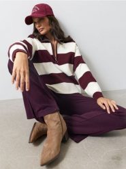 Prążkowane legginsy flare z domieszką bawełny - czerwony. Czerwone legginsy damskie Sinsay, l, bez wzorów, z bawełny. Za 49.99 zł.