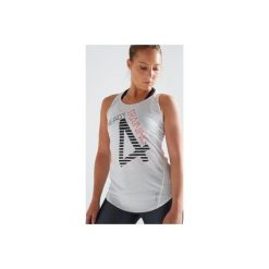 Top fitness kardio damski 120 biały. Białe topy sportowe damskie DOMYOS, bez wzorów, z elastanu, bez ramiączek. Za 29.99 zł.