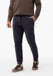 Spodnie dresowe N-KANTON. Niebieskie spodnie dresowe męskie Volcano, bez wzorów, z bawełny. Za 139.99 zł.