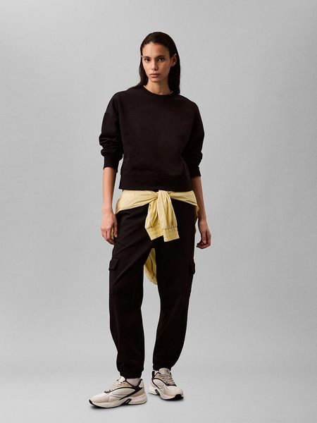 Calvin Klein Bluza w kolorze czarnym rozmiar: L. Czarne bluzy bez kaptura damskie CALVIN KLEIN, l. Za 221.95 zł.