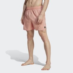 Szorty do pływania Solid CLX Short-Length. Brązowe szorty męskie Adidas, bez wzorów, z materiału, klasyczne. W wyprzedaży za 120.00 zł.