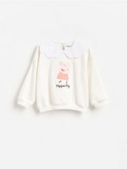 Bluza z kołnierzykiem Świnka Peppa - złamana biel. Bluzy i bluzki niemowlęce Reserved, bez wzorów, z bawełny, bez ramiączek, bez kaptura. Za 55.99 zł.