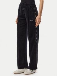 Guess Spodnie dresowe V6BB10 K6303 Czarny Regular Fit. Czarne spodnie dresowe damskie Guess, xl, z aplikacjami, z dresówki. Za 434.99 zł.