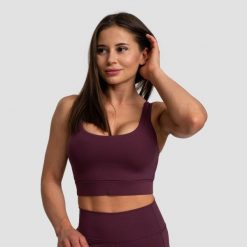Stanik sportowy damski z regulowanymi ramiączkami Cut-Out. Czerwone biustonosze sportowe damskie GYMBEAM, bez wzorów, z elastanu. Za 81.90 zł.