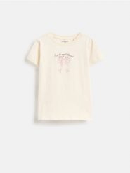 T-shirt z nadrukiem - kremowy. Białe koszulki dziewczęce Reserved, bez wzorów, z bawełny, bez ramiączek. Za 19.99 zł.
