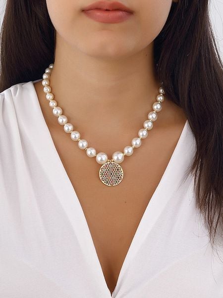 Nakkash Pozłacany naszyjnik "Flower of Life" z cyrkoniami i masą perłową rozmiar: onesize. Białe naszyjniki damskie Nakkash, metalowe. Za 60.88 zł.