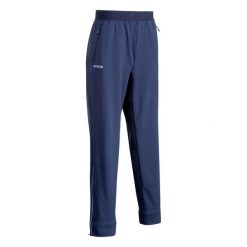 Spodnie treningowe do hokeja na trawie męskie Korok FH900. Niebieskie spodnie materiałowe męskie KOROK, bez wzorów, z elastanu, sportowe. W wyprzedaży za 119.99 zł.