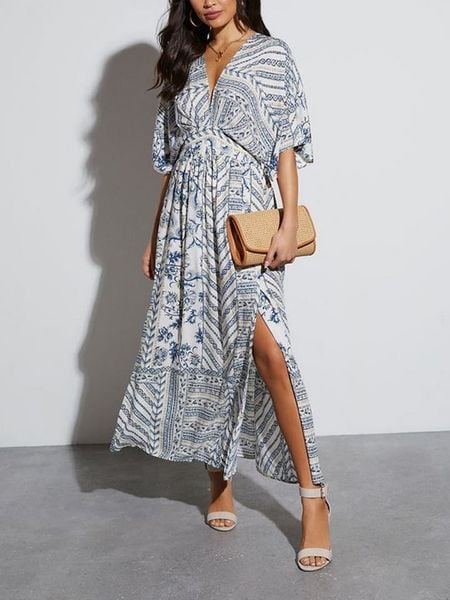 Milan Kiss Sukienka w kolorze biało-niebieskim rozmiar: M. Białe sukienki damskie Milan Kiss, na co dzień, m, bez wzorów, bez kołnierzyka, bez ramiączek, maxi, proste. Za 173.99 zł.