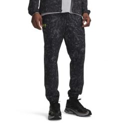Spodnie treningowe Under Armour Vibe Woven Jogger 1386557. Białe spodnie sportowe męskie Under Armour, z elastanu. Za 348.95 zł.
