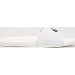 Lacoste - Klapki. Białe klapki i japonki męskie Lacoste, z materiału. W wyprzedaży za 149.90 zł.