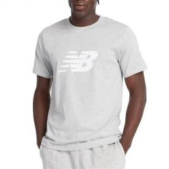 Koszulka sportowa męska New Balance MT43906AG. Szare t-shirty sportowe męskie New Balance, l, z tkaniny, bez ramiączek, na fitness i siłownię. Za 175.00 zł.