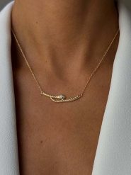 Les Favorites Pozłacany naszyjnik z elementem ozdobnym - dł. 40 cm rozmiar: onesize. Niebieskie naszyjniki damskie Les Favorites, pozłacane. Za 108.99 zł.