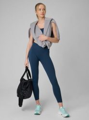 4F Legginsy treningowe bezszwowe damskie - turkusowe XS/S. Niebieskie legginsy damskie 4f, l, bez wzorów, ze skóry. Za 129.99 zł.