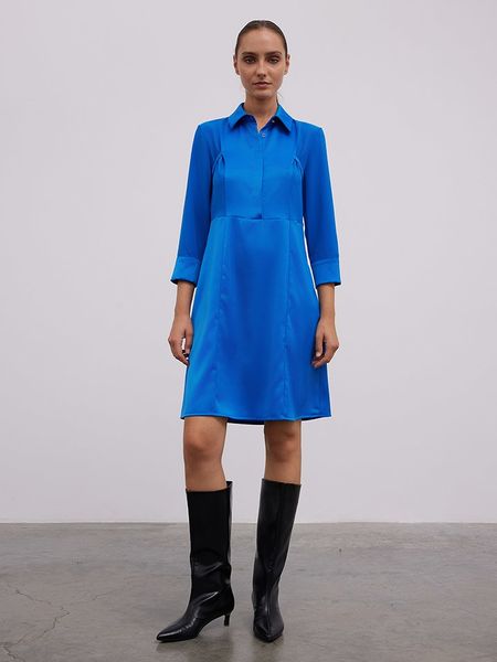 BGN Sukienka w kolorze niebieskim rozmiar: 38. Niebieskie sukienki damskie BGN, na co dzień, bez wzorów, z tkaniny, bez kołnierzyka, bez ramiączek, midi, proste. Za 143.56 zł.