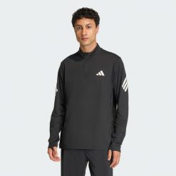 Bluza adi365 Iconic 1/2 Zip. Czarne bluzy bez kaptura męskie Adidas, bez wzorów, sportowe, bez kołnierzyka, bez ramiączek. Za 219.00 zł.