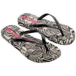 Japonki Ipanema Animal 83617 AY386 czarna zebra czarne. Czarne klapki damskie bez wzorów, z materiału, bez obcasa. Za 168.77 zł.