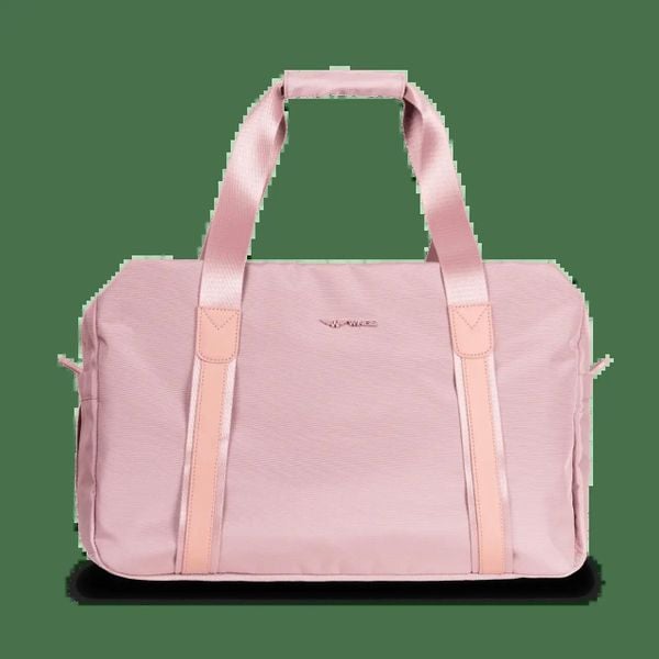 WINGS Torba sportowo - podróżna SKYLARK pink. Czerwone torebki klasyczne damskie Wings, w ażurowe wzory, z materiału, duże, bez dodatków. Za 149.90 zł.