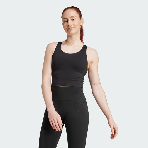 Koszulka na ramiączkach All Me z wbudowanym biustonoszem o średnim wsparciu. Czarne bluzki sportowe damskie Adidas, l, bez wzorów, z elastanu, bez ramiączek. Za 219.00 zł.