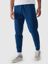 4F Spodnie dresowe joggery męskie - turkusowe L. Niebieskie spodnie dresowe męskie 4f, bez wzorów, z bawełny. Za 149.99 zł.