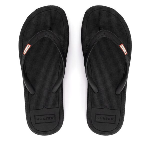 Japonki Hunter. Czarne klapki damskie Hunter, bez wzorów, bez obcasa. Za 129.99 zł.