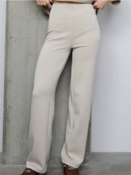 Spodnie wide leg z dzianiny scuba - kremowy. Białe spodnie materiałowe damskie Sinsay, bez wzorów, z dzianiny. Za 39.99 zł.