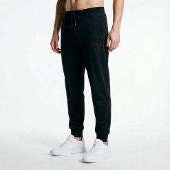 Spodnie sportowe męskie Armani Exchange czarne (6DZPAB-ZJKBZ-1200) L. Czarne spodnie sportowe męskie Armani Exchange, z bawełny. Za 573.85 zł.