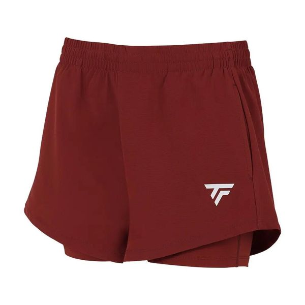 Szorty damskie Tecnifibre Team. Białe szorty damskie TECNIFIBRE, bez wzorów, z elastanu, klasyczne, z standardowym stanem. Za 148.50 zł.
