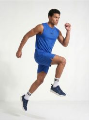 Sportowa koszulka bez rękawów SNSY PERFORMANCE - niebieski. Niebieskie t-shirty sportowe męskie Sinsay, l, bez ramiączek. Za 25.99 zł.