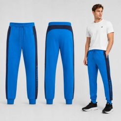 SPODNIE MĘSKIE DRESOWE 4F JOGGERY SPORTOWE NIEBIESKIE. Niebieskie spodnie sportowe męskie 4f, z bawełny. Za 159.99 zł.