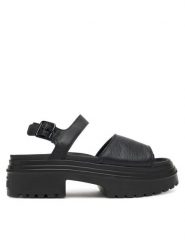 Converse Sandały Chuck Taylor All Star Lugged Heel A12189C Czarny. Czarne sandały damskie Converse, bez wzorów, ze skóry, bez obcasa, na płaskiej podeszwie. Za 229.99 zł.