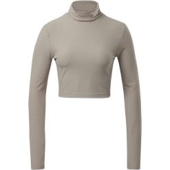 Koszulka sportowa damska Reebok CL WDE Cozy. Brązowe bluzki sportowe damskie Reebok, m, bez wzorów, z elastanu, bez ramiączek. Za 60.00 zł.