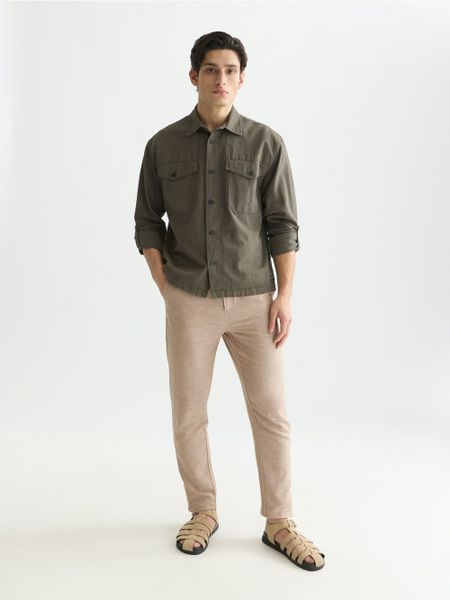 Scotch & Soda spodnie materiałowe z zawartością lnu Mężczyźni Bawełna brązowy, 32-30. Brązowe spodnie materiałowe męskie Scotch & Soda, bez wzorów, z bawełny. Za 379.95 zł.